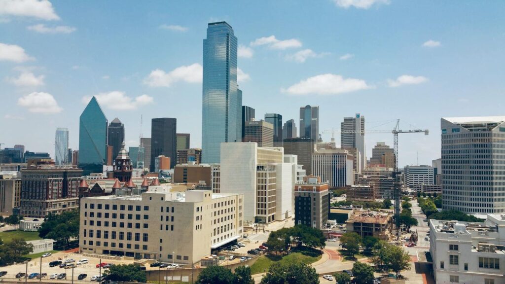 Dallas and Chicago skylines showing migration-driven real estate changes